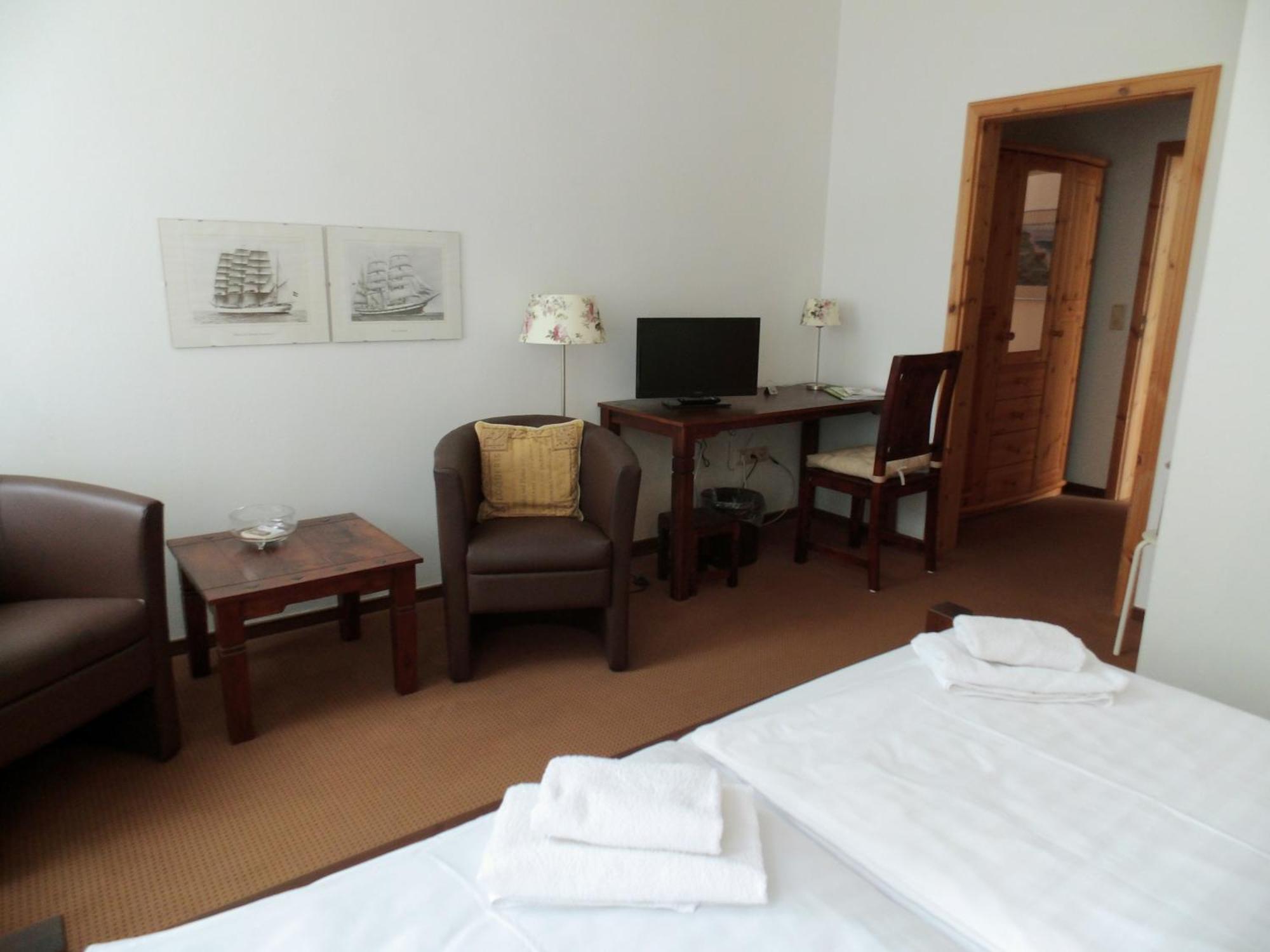Pension & Restaurant "Alte Schule" Kluis Стая снимка