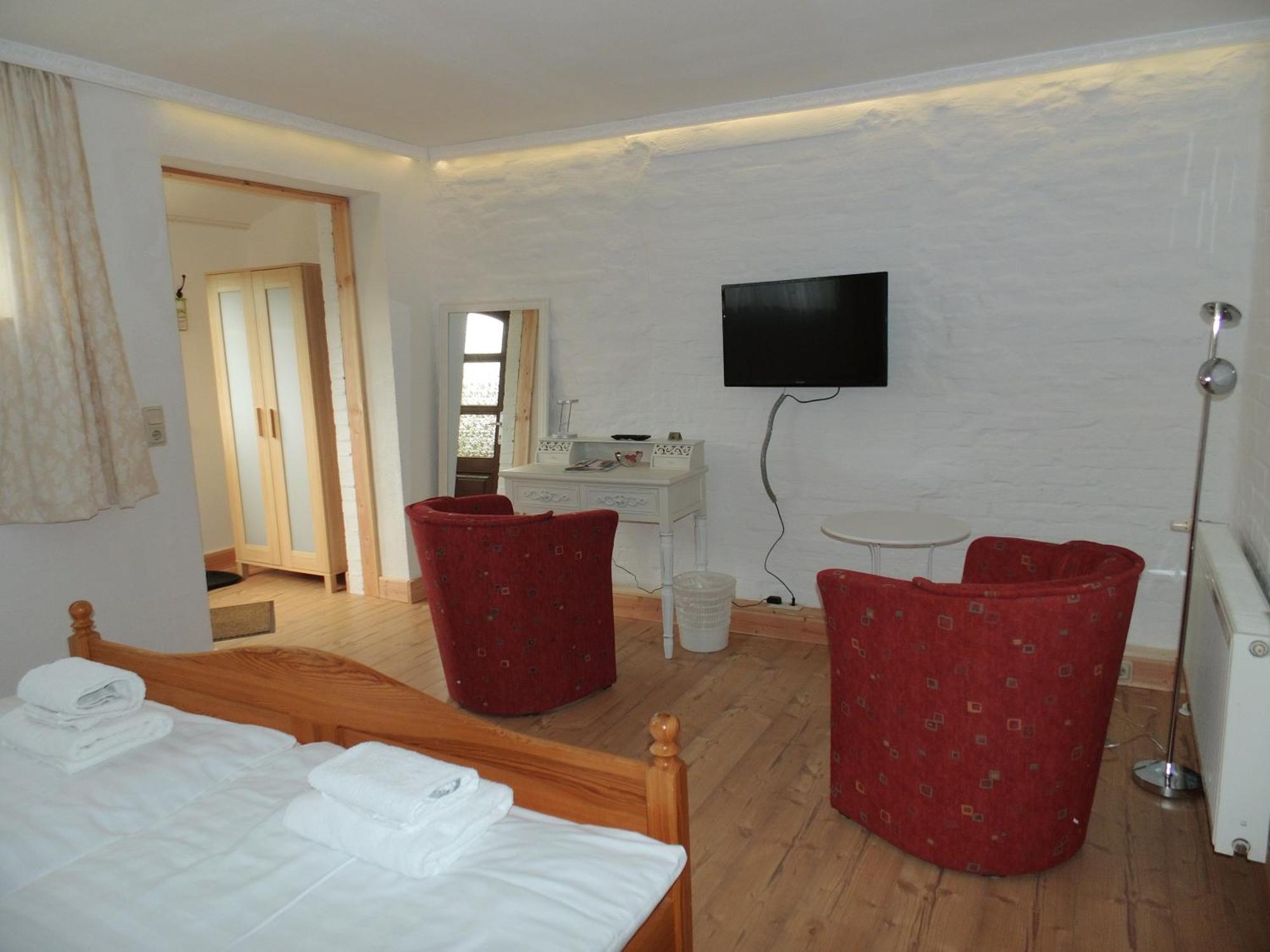 Pension & Restaurant "Alte Schule" Kluis Стая снимка